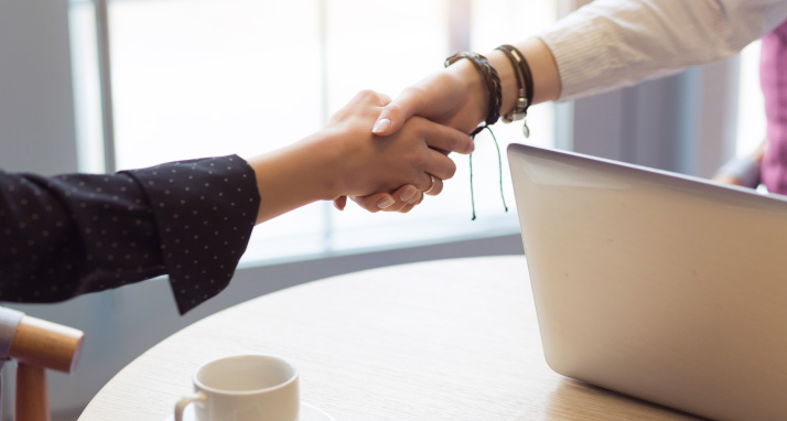 colleagues shaking hands