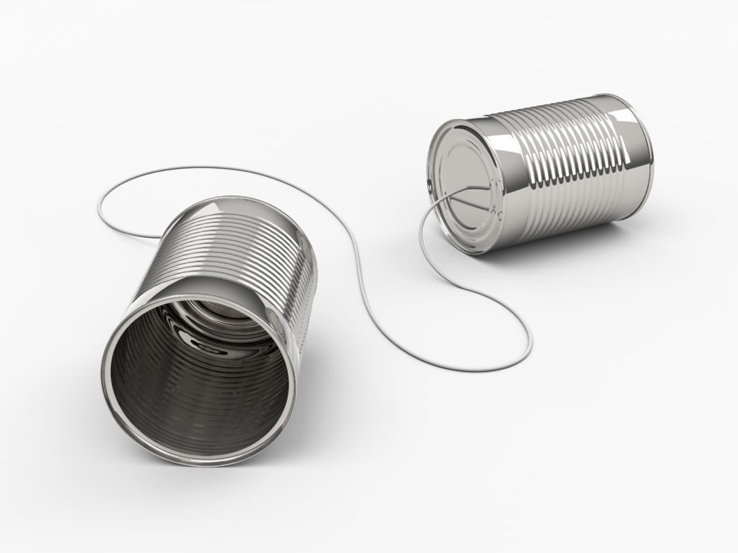 Two tin cans connected by a string